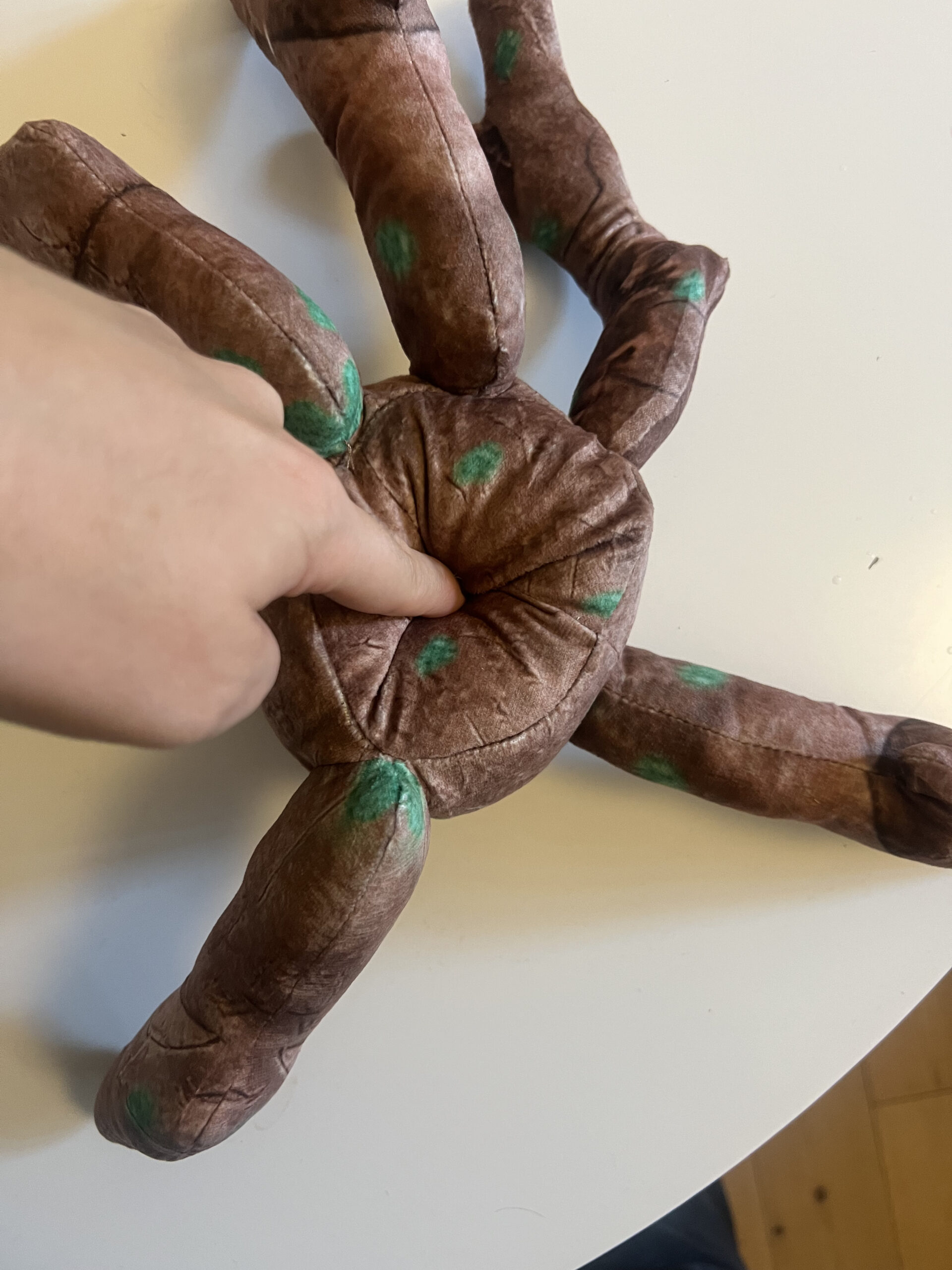 Close-up showing the soft fabric of the Project Hail Mary Rocky plush