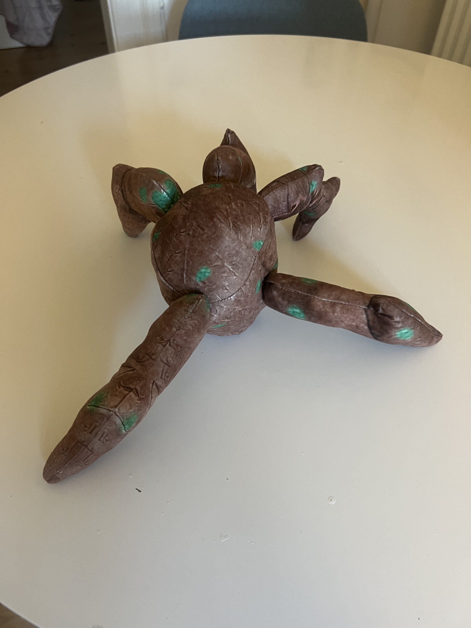 Project Hail Mary Rocky plush during a second standing attempt