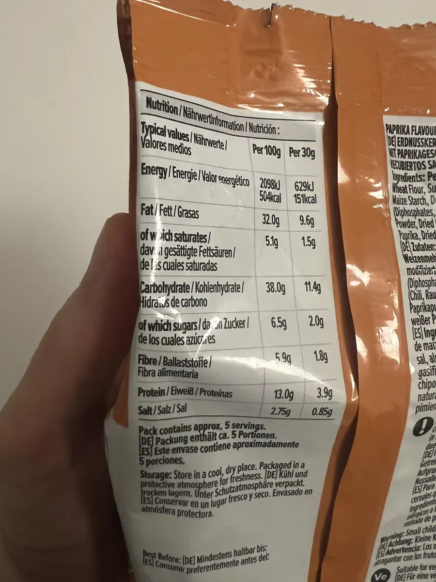 Nutrition facts on my by Amazon Paprika Coated Peanuts 170g bag showing 504 kcal and 2.75g salt per 100g