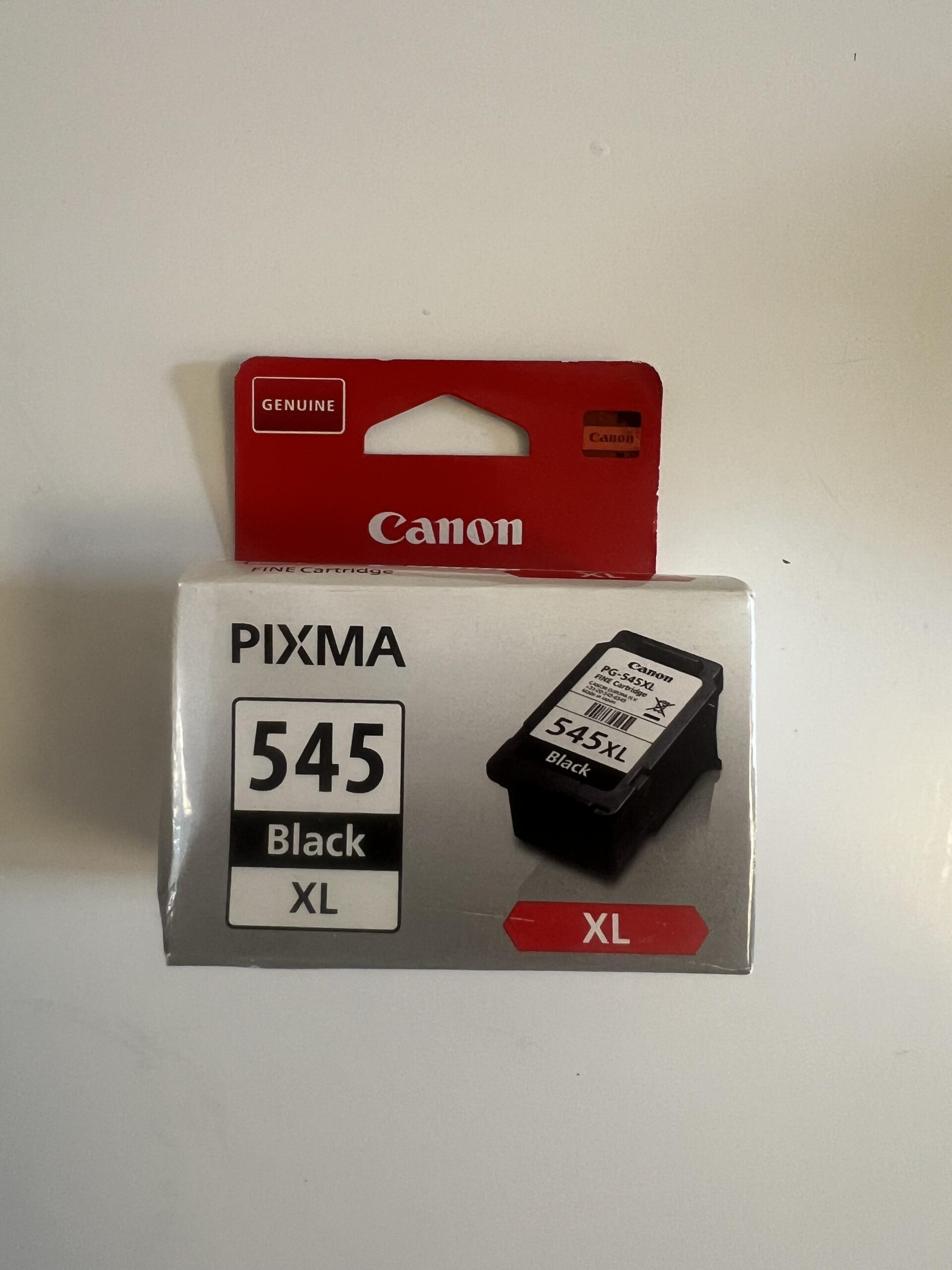 Original front photo of genuine Canon PIXMA PG-545XL Black ink cartridge retail package showing Canon logo and XL designation