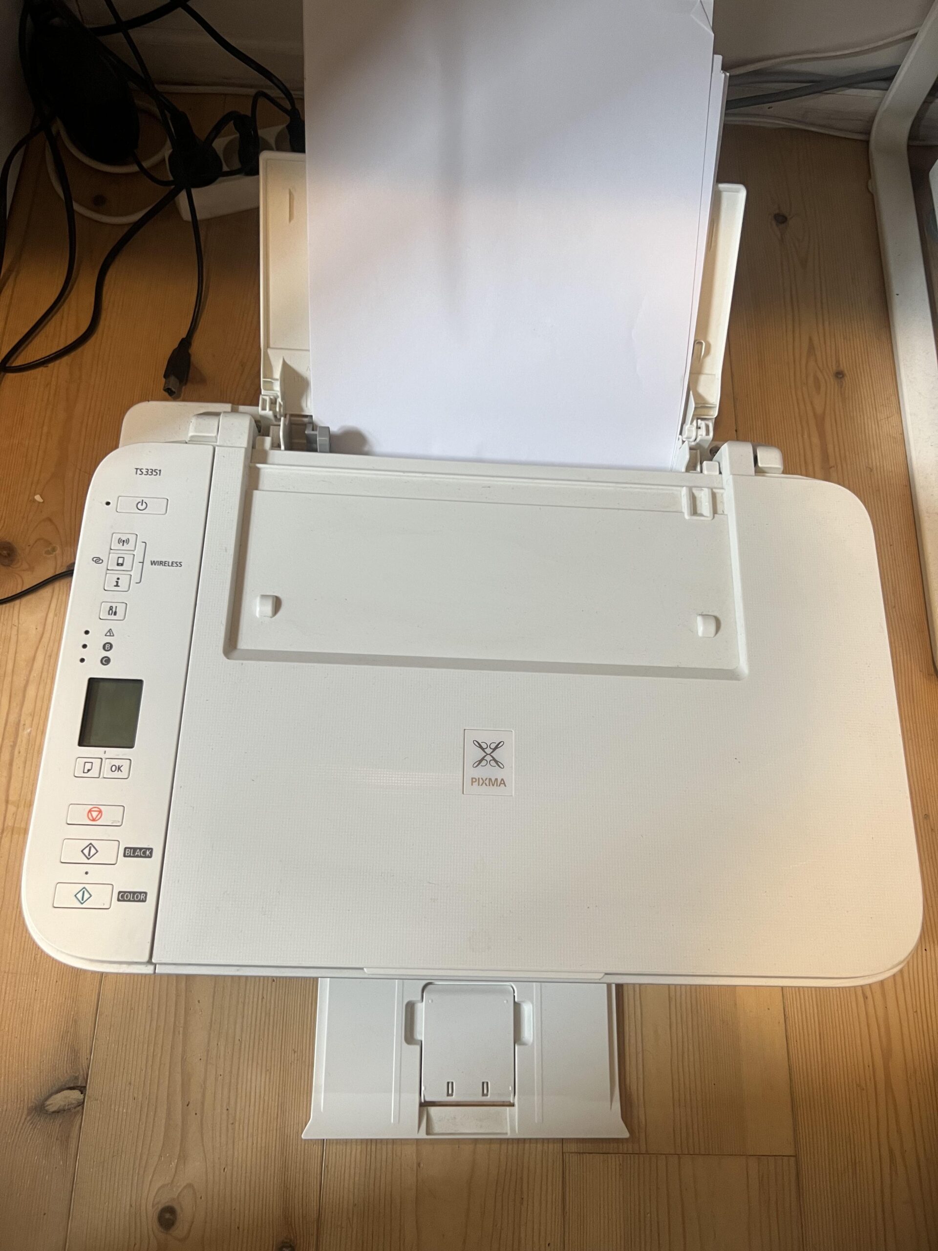 Original overhead photo of the Canon PIXMA TS3351 rear paper feeder with A4 paper