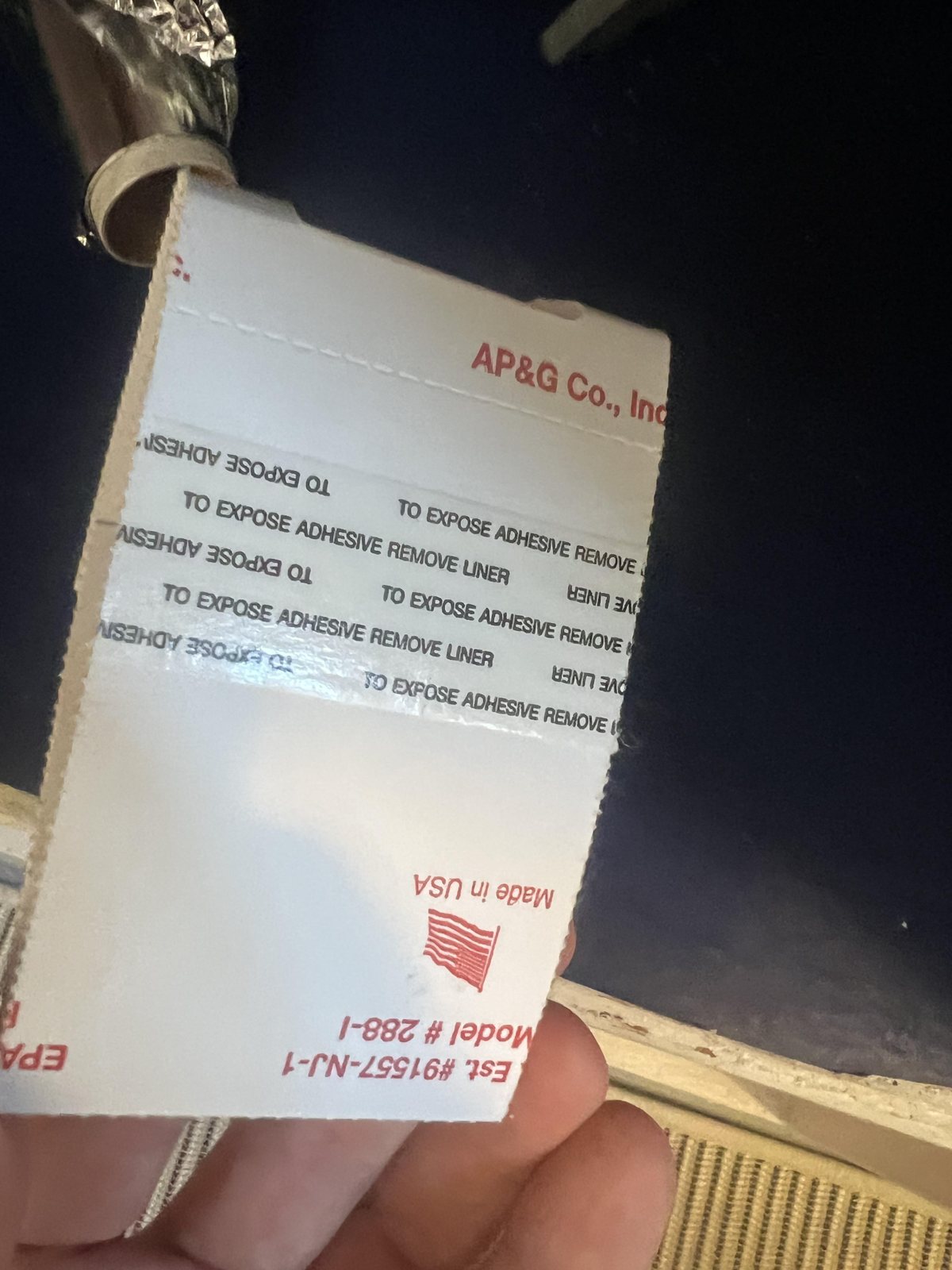 The reverse of my Catchmaster 288i trap showing the manufacturer's printed adhesive liner and fold marks