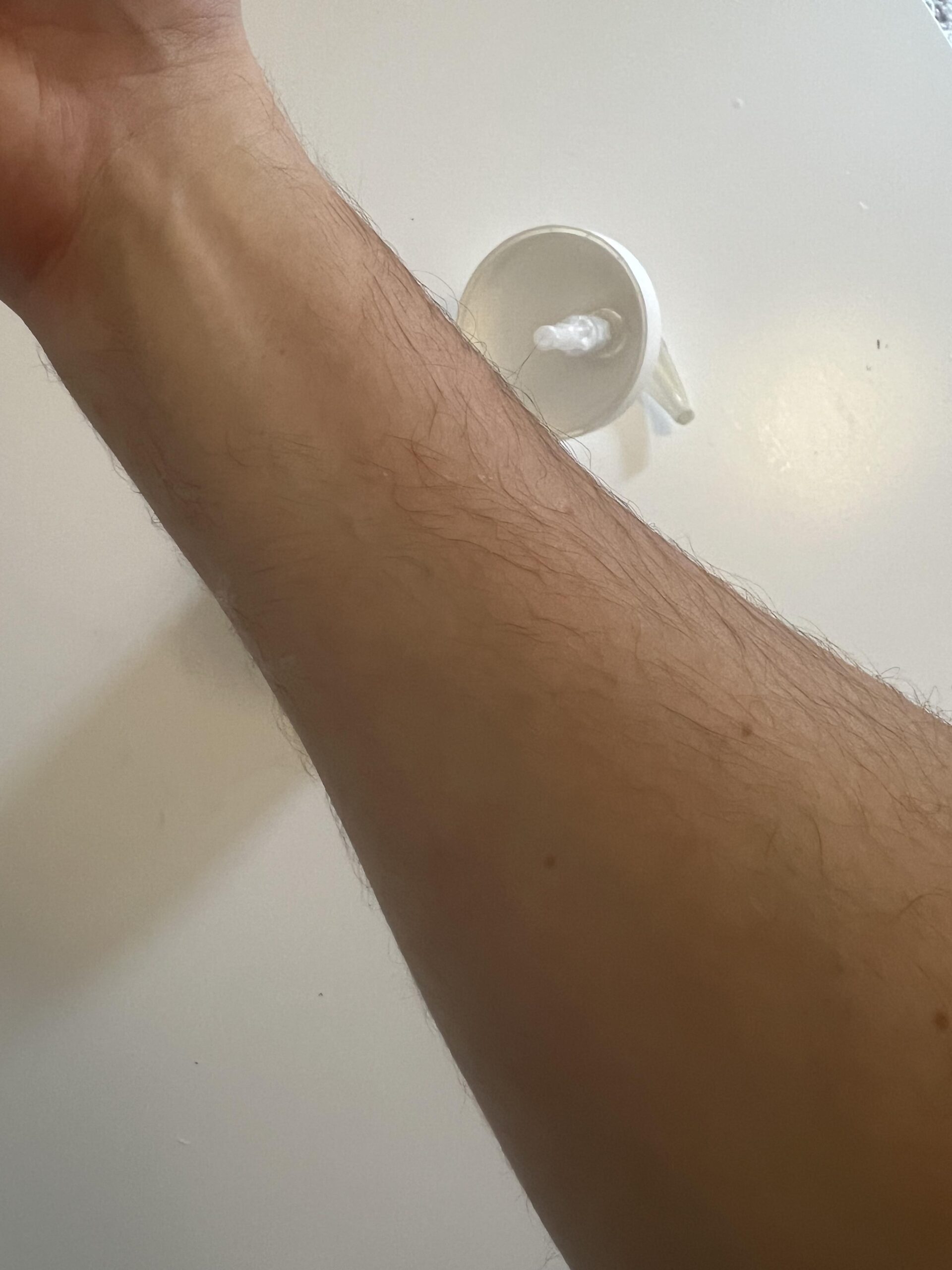 My arm photographed after CeraVe Moisturising Cream application