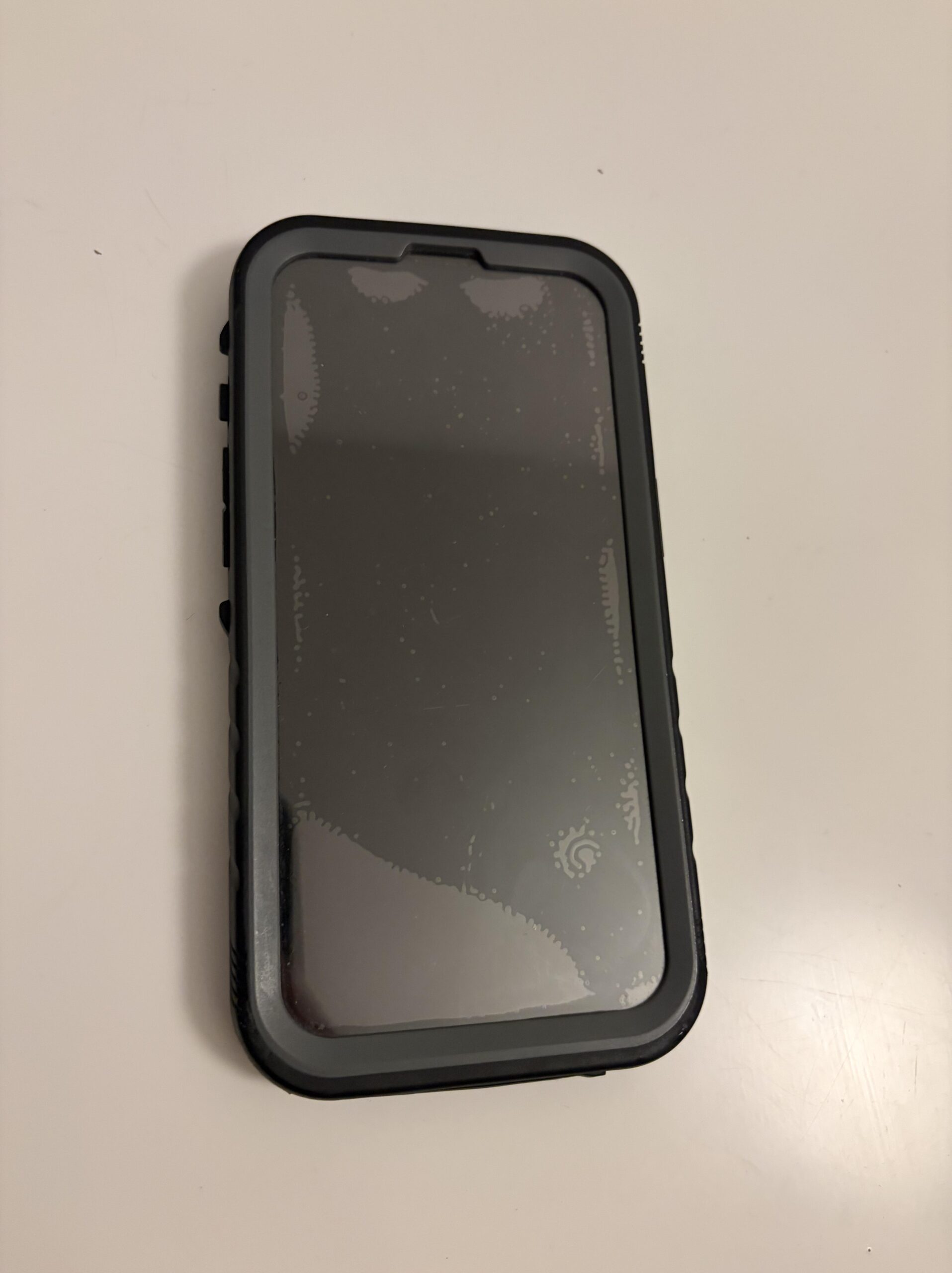 Close-up of the built-in screen protector on my Cozycase waterproof iPhone 13 Pro case