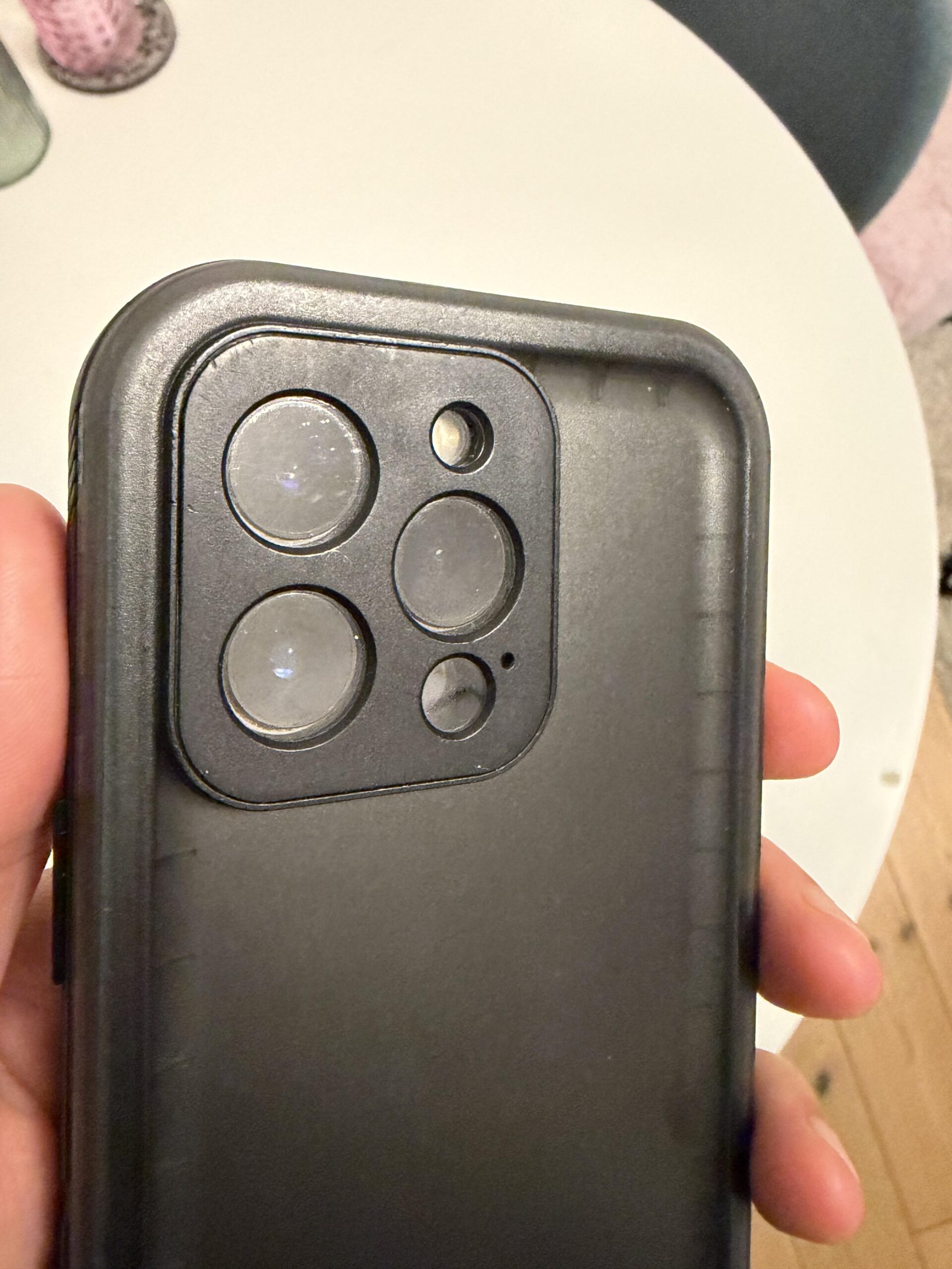 Close-up of the camera protection on my black Cozycase waterproof iPhone 13 Pro case