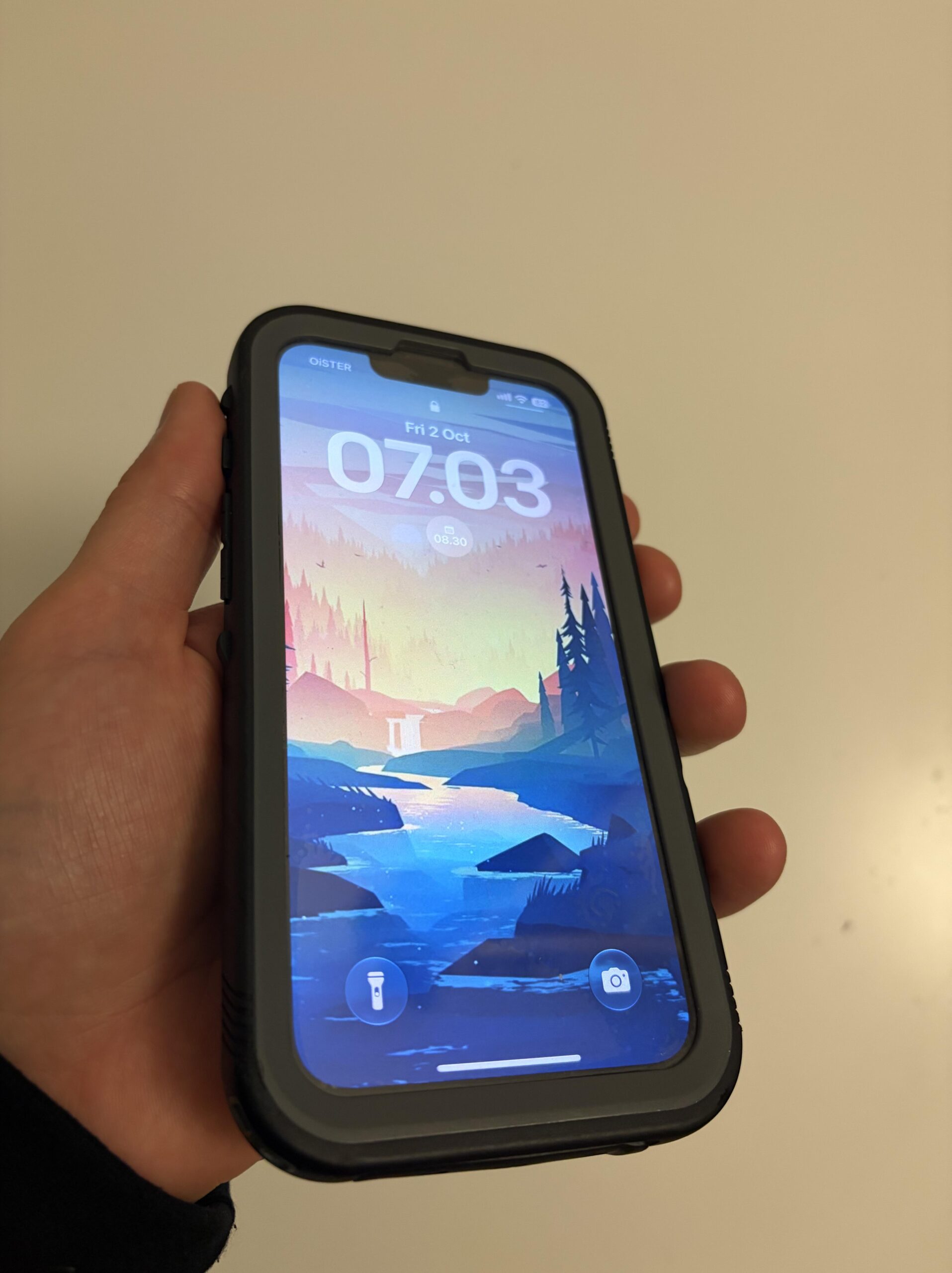 Angled front view of my black Cozycase waterproof case installed on an iPhone 13 Pro