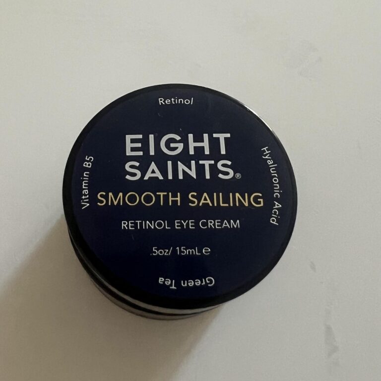 Clear overhead photo of the actual Eight Saints Smooth Sailing Retinol Eye Cream 15 ml jar with navy lid and fully legible product branding