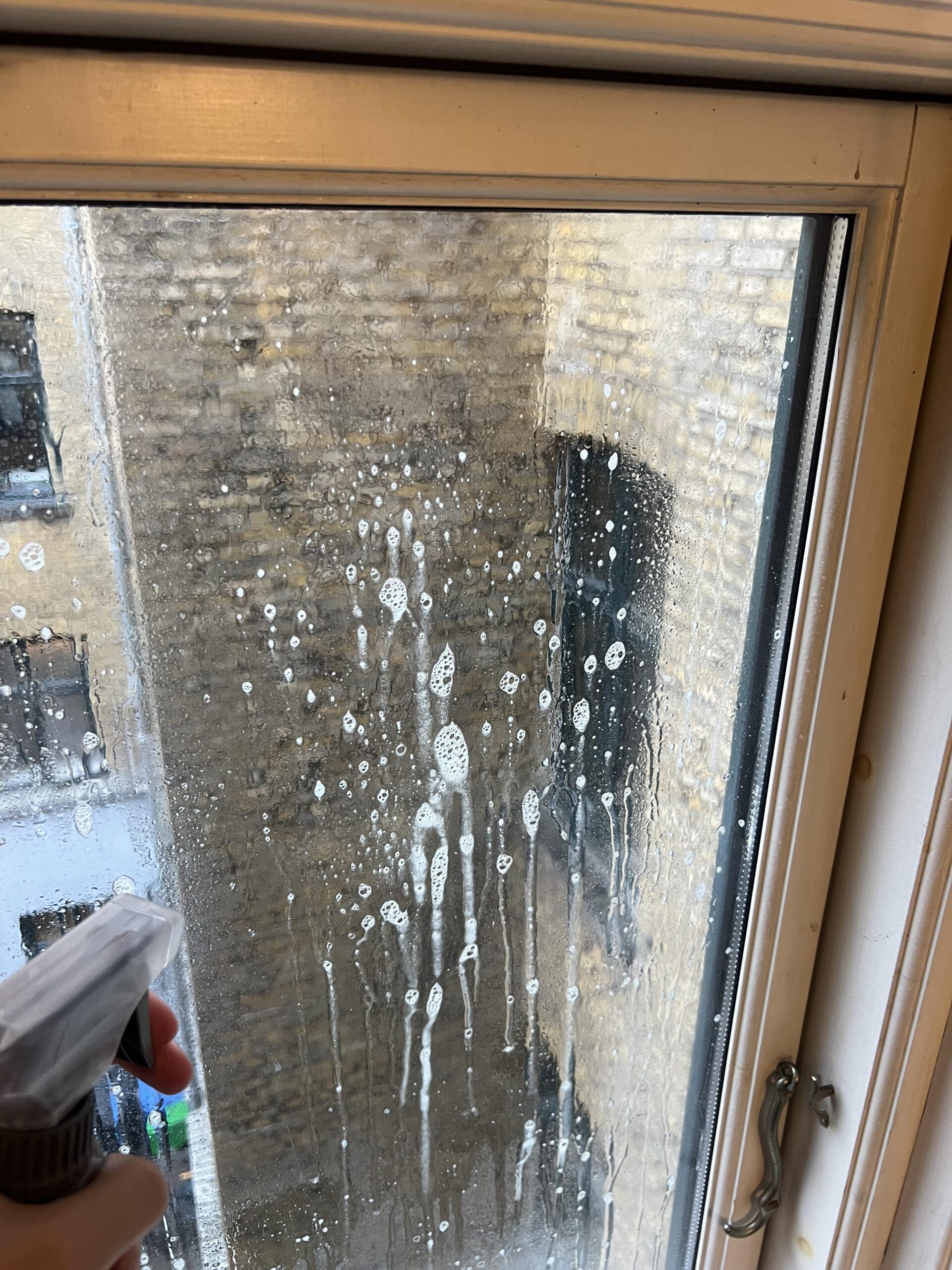 Windowpane with cleaner droplets during my Frosch test