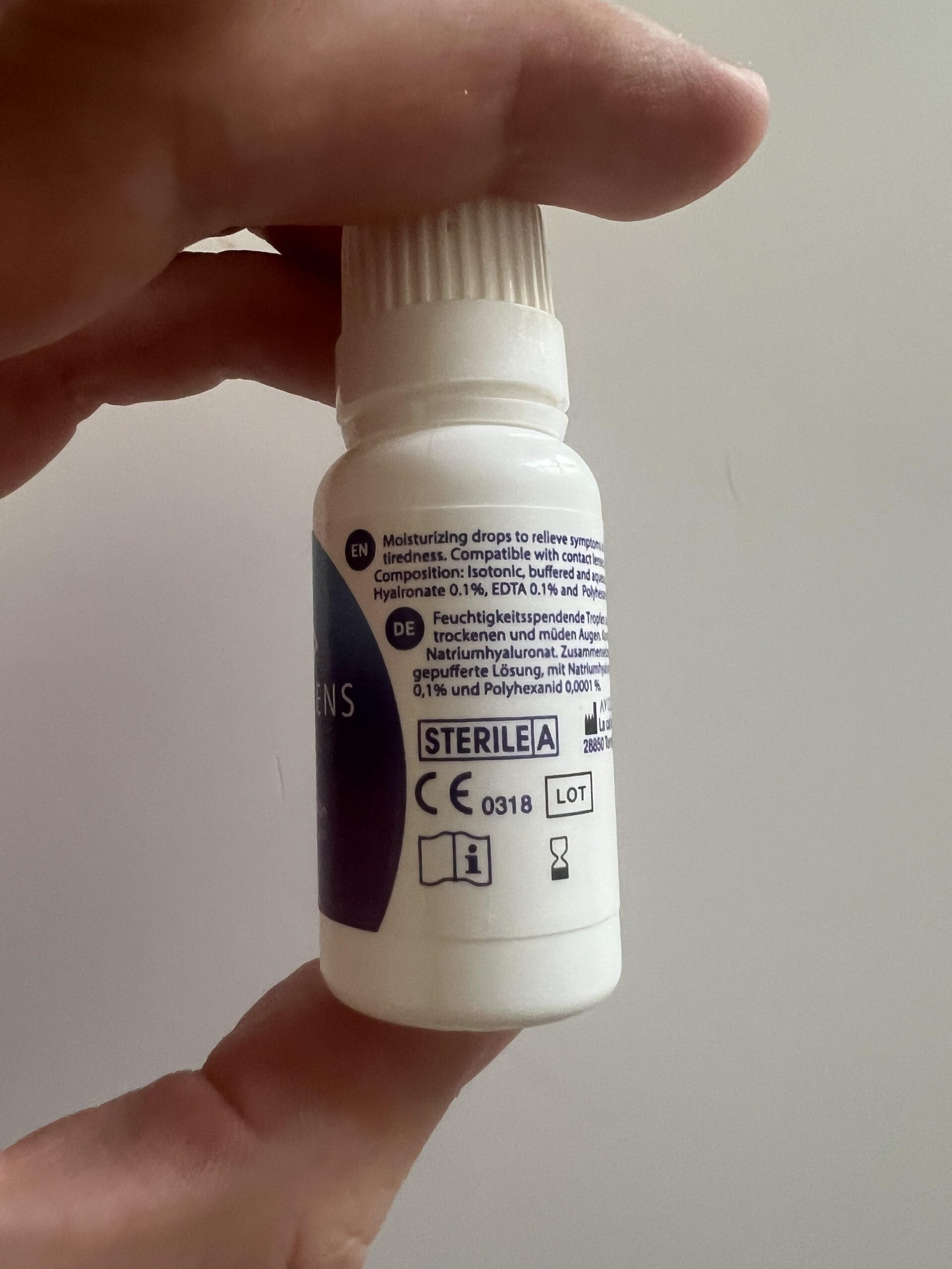 My original side-label photograph of Glamlens eye drops showing sodium hyaluronate composition and sterile marking