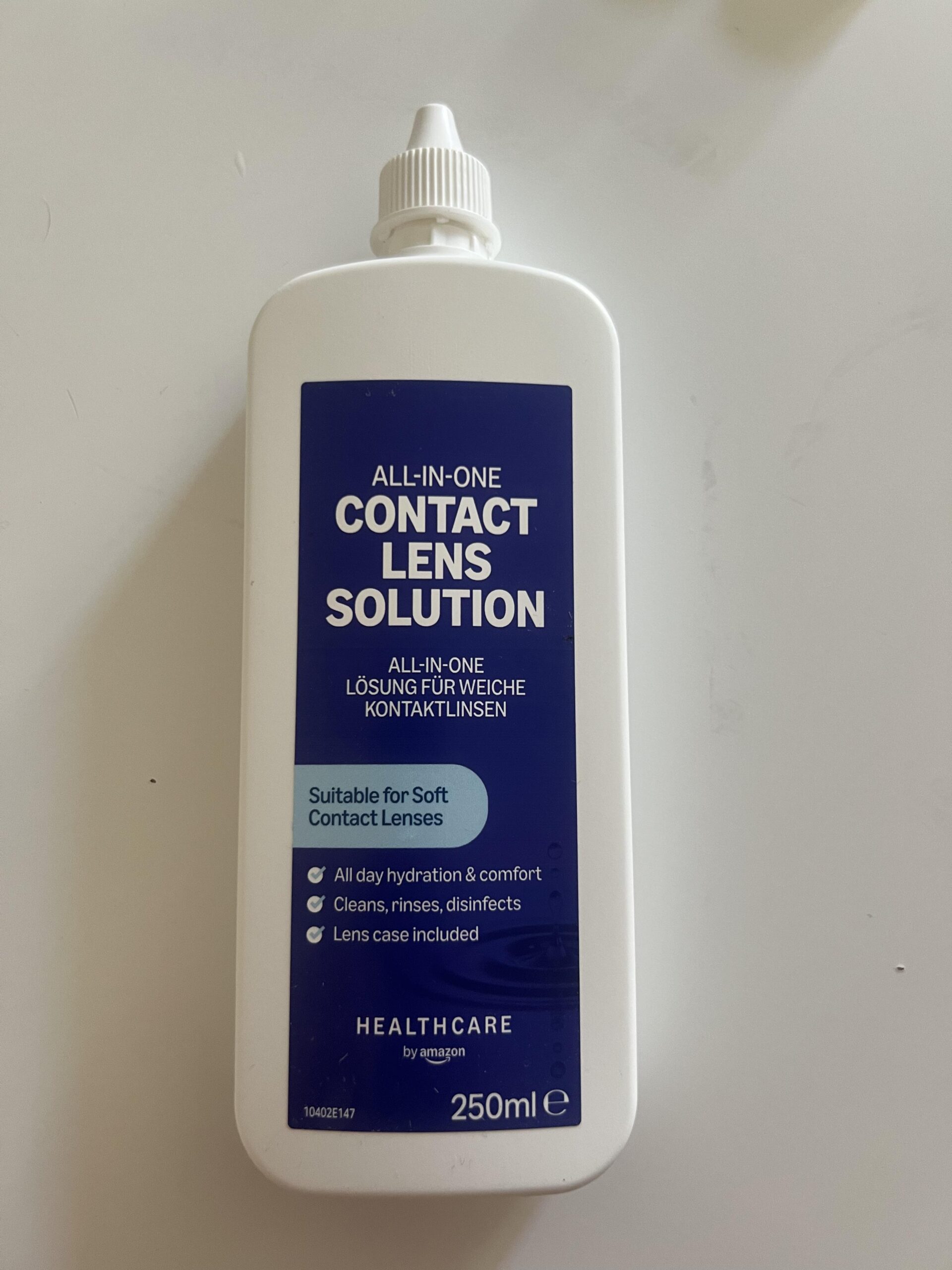 My original photo of the white 250 ml Healthcare by Amazon All-In-One Contact Lens Solution bottle, with blue label