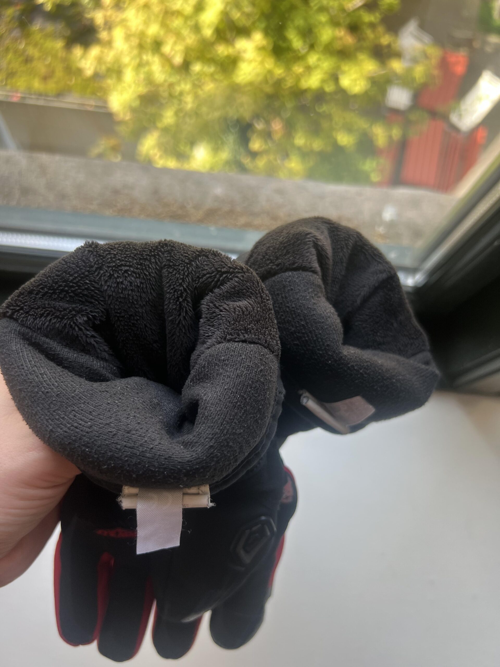 Inside lining of IRON JIA'S winter motorcycle gloves after about three seasons of use