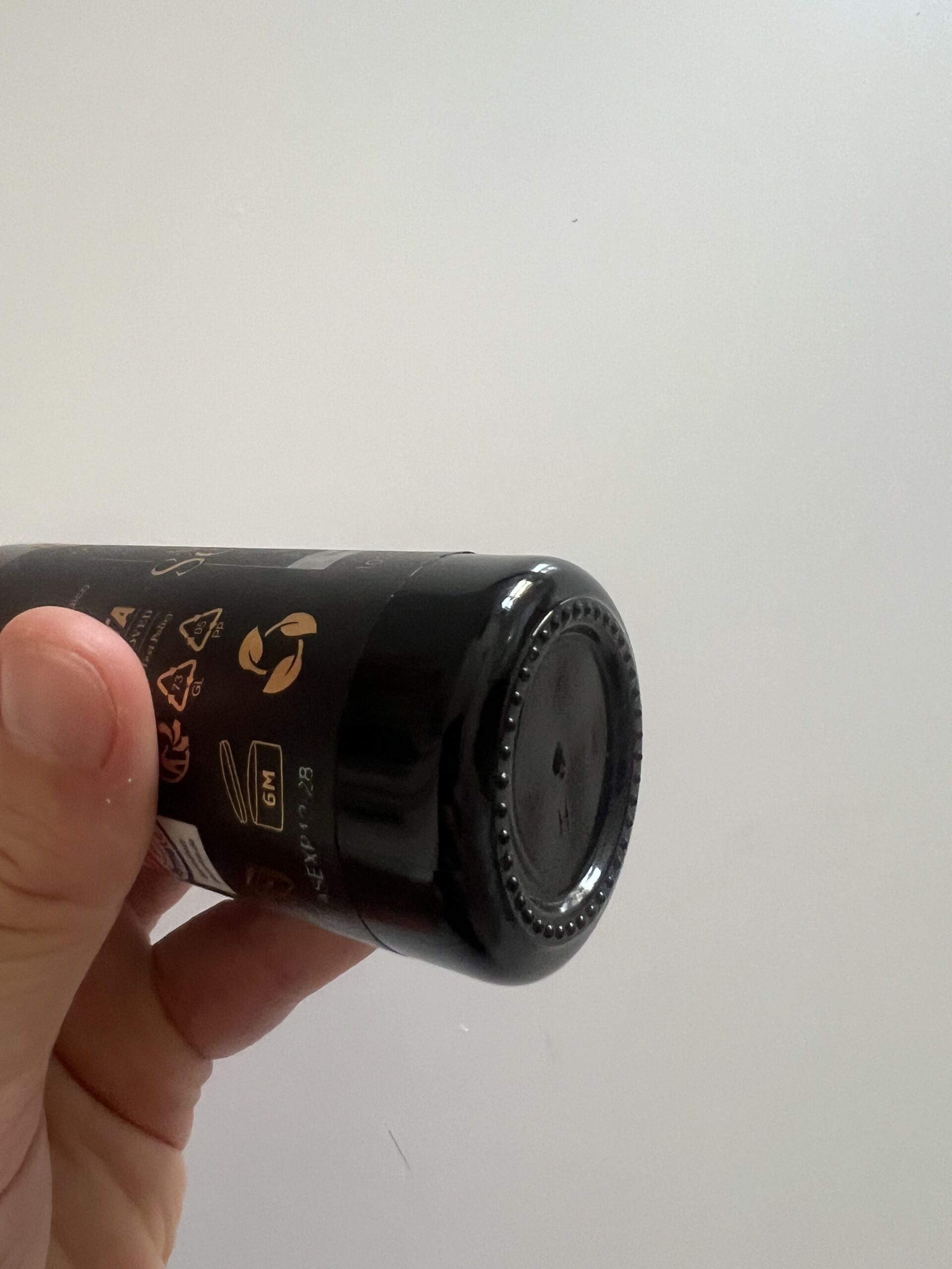 Original photograph showing the bottom of my actual Kapua Naturals azelaic acid serum 100ml bottle with packaging marks