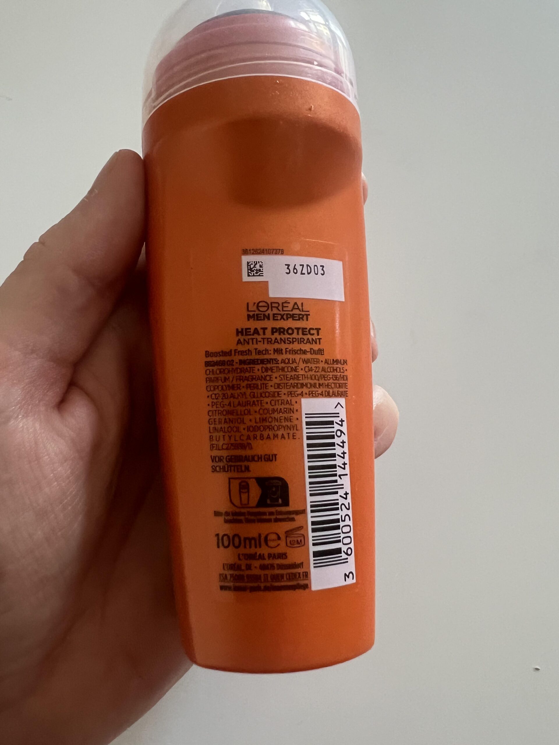 My original back-label photo of L'Oréal Men Expert Heat Protect 100 ml, showing the ingredient list, 100 ml volume and batch label
