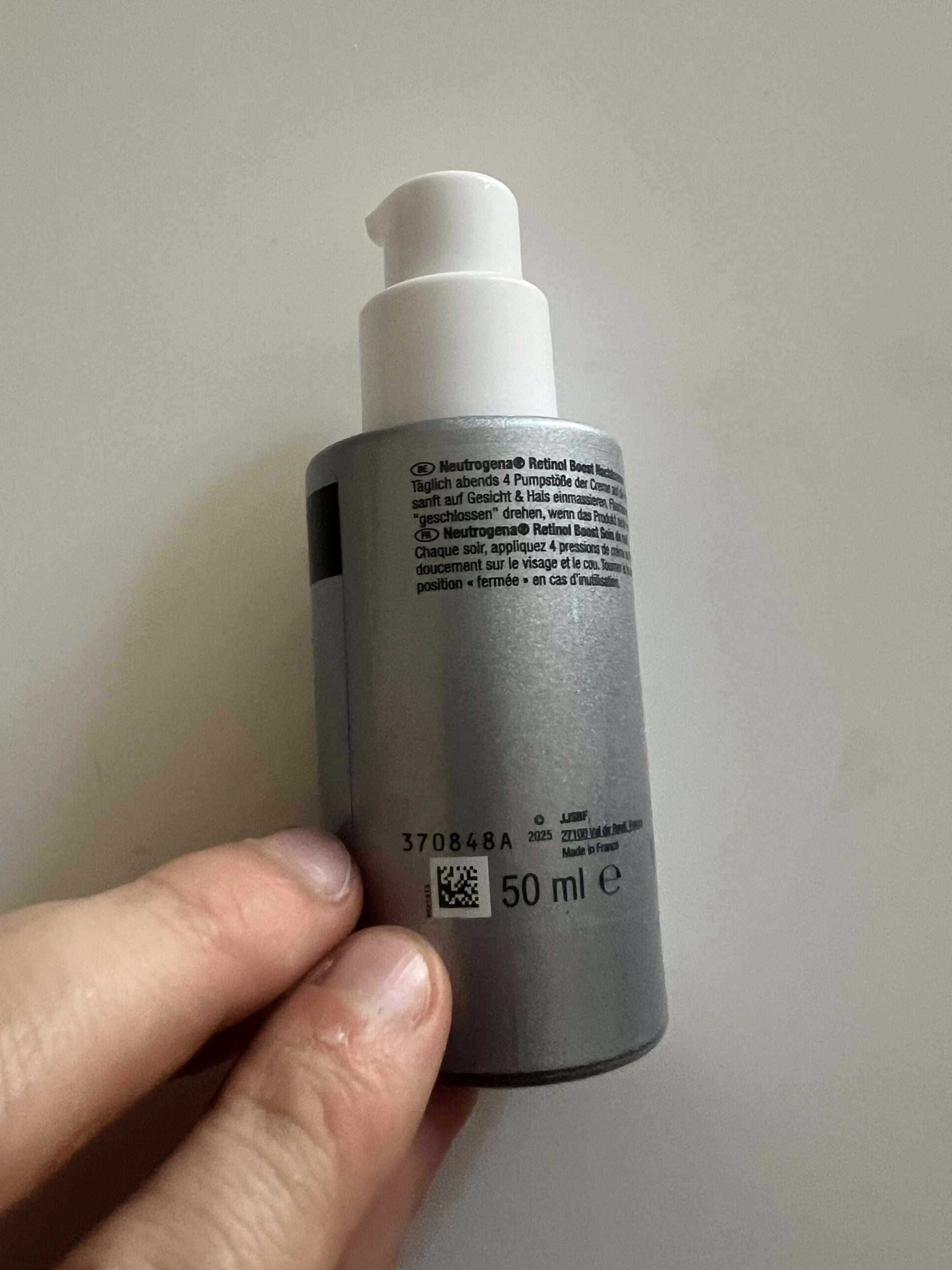 Original photo of the back of my Neutrogena Retinol Boost Night Cream bottle showing the four-pump evening directions and 50 ml capacity