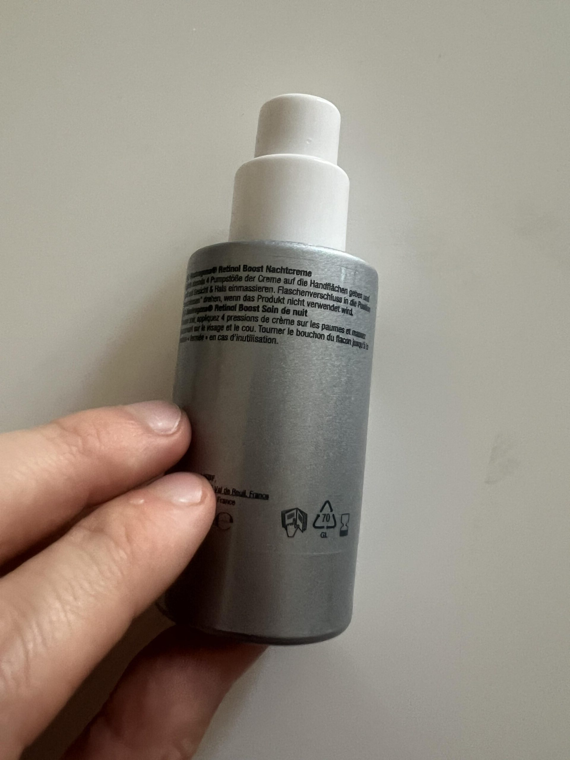 Original upright photograph of the Neutrogena Retinol Boost night cream back safety label, showing instructions and precautions
