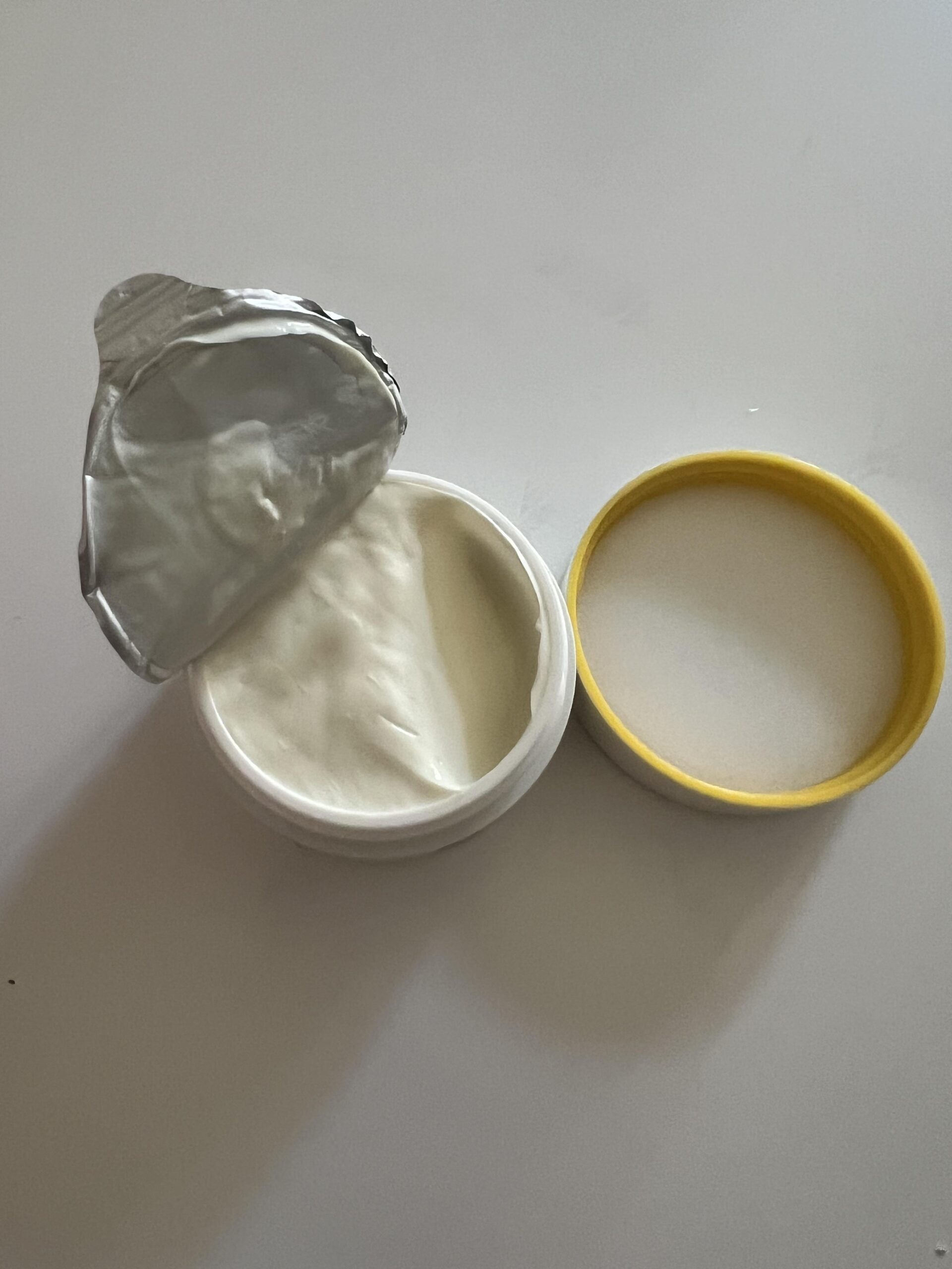 Used NIVEA Q10 Power SPF 30 jar with foil peeled open and face cream remaining inside