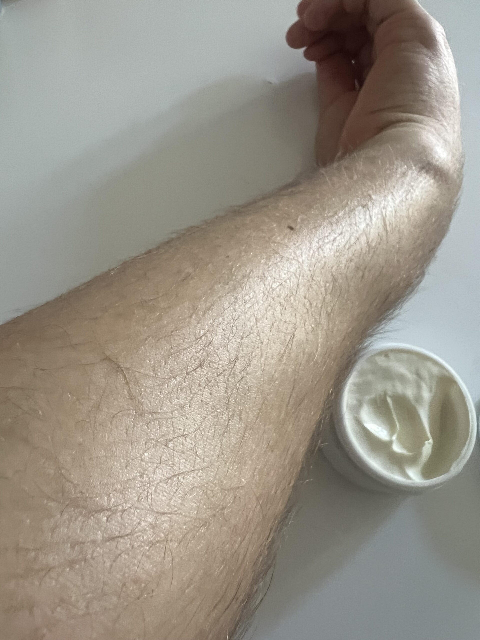Forearm after NIVEA Q10 Power day cream SPF 30 has been rubbed into the skin