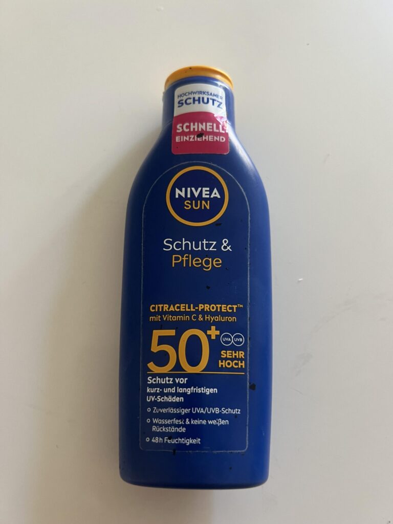 My original photo of the front of NIVEA SUN Schutz & Pflege SPF 50+ 200 ml blue sunscreen bottle with orange cap and CitraCell-Protect label
