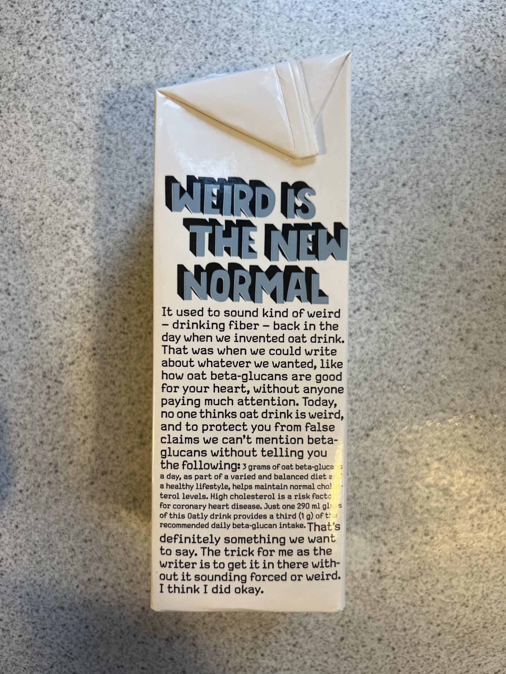 Original side panel of Oatly No Sugars 1L carton with printed branding