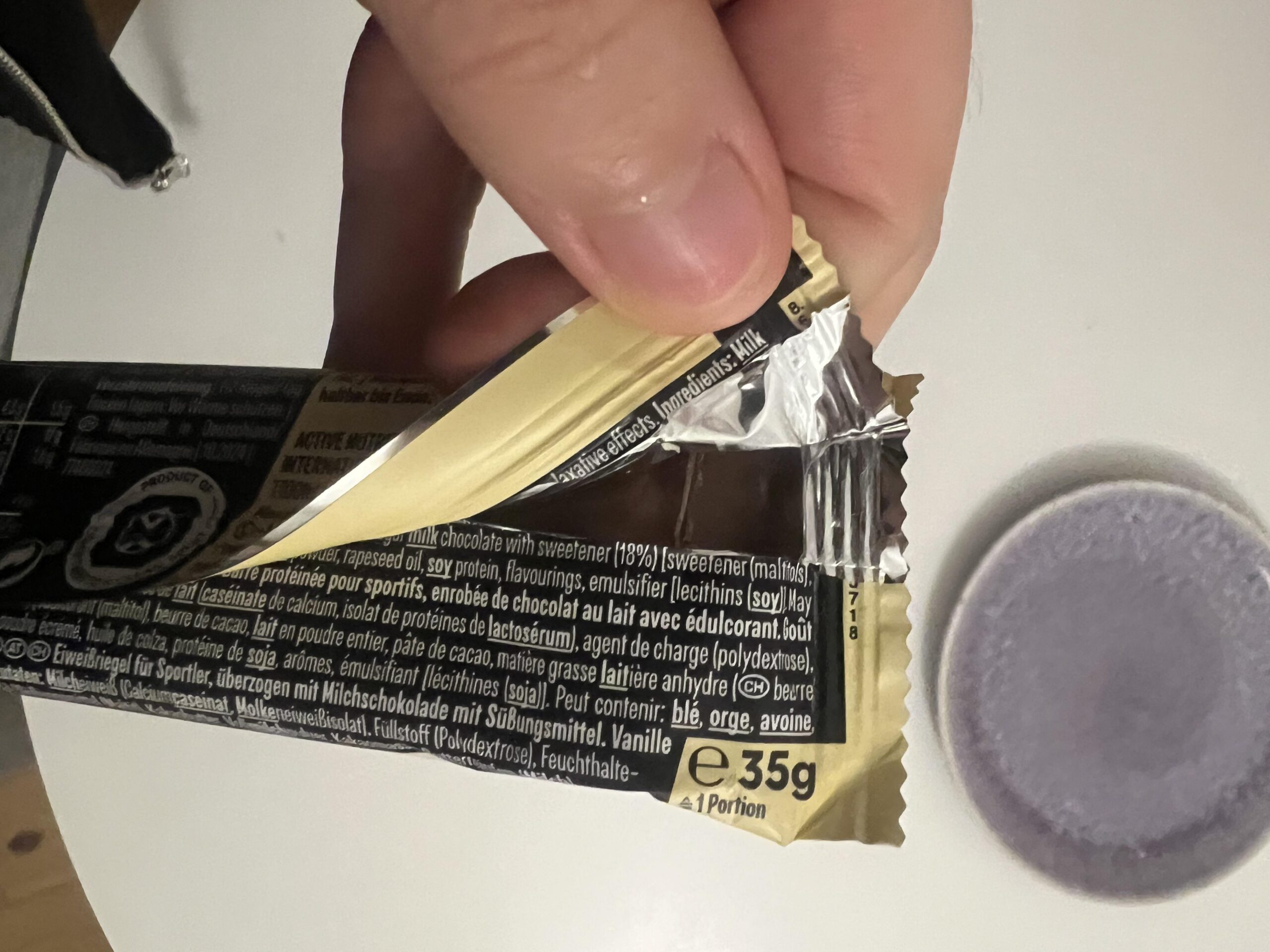 Opened PowerBar Vanilla 35 g wrapper with ingredient list and 35 g weight printed on the back
