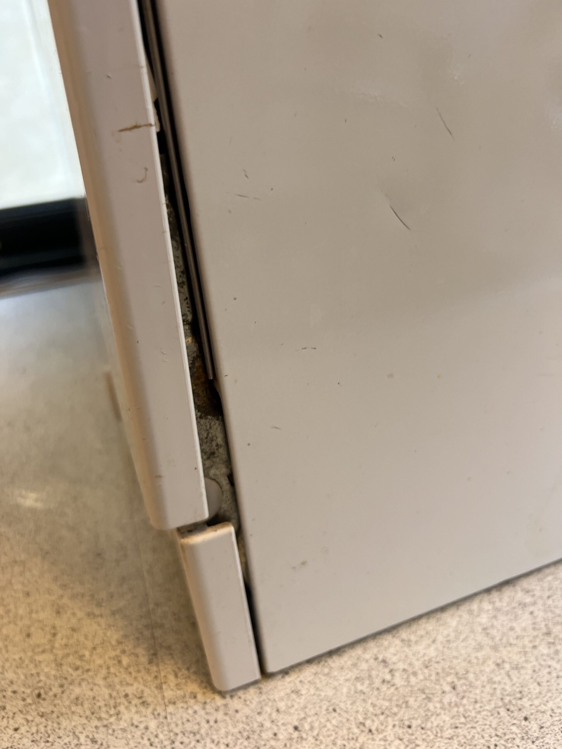 Side panel of Siemens countertop dishwasher beginning to loosen after long-term use