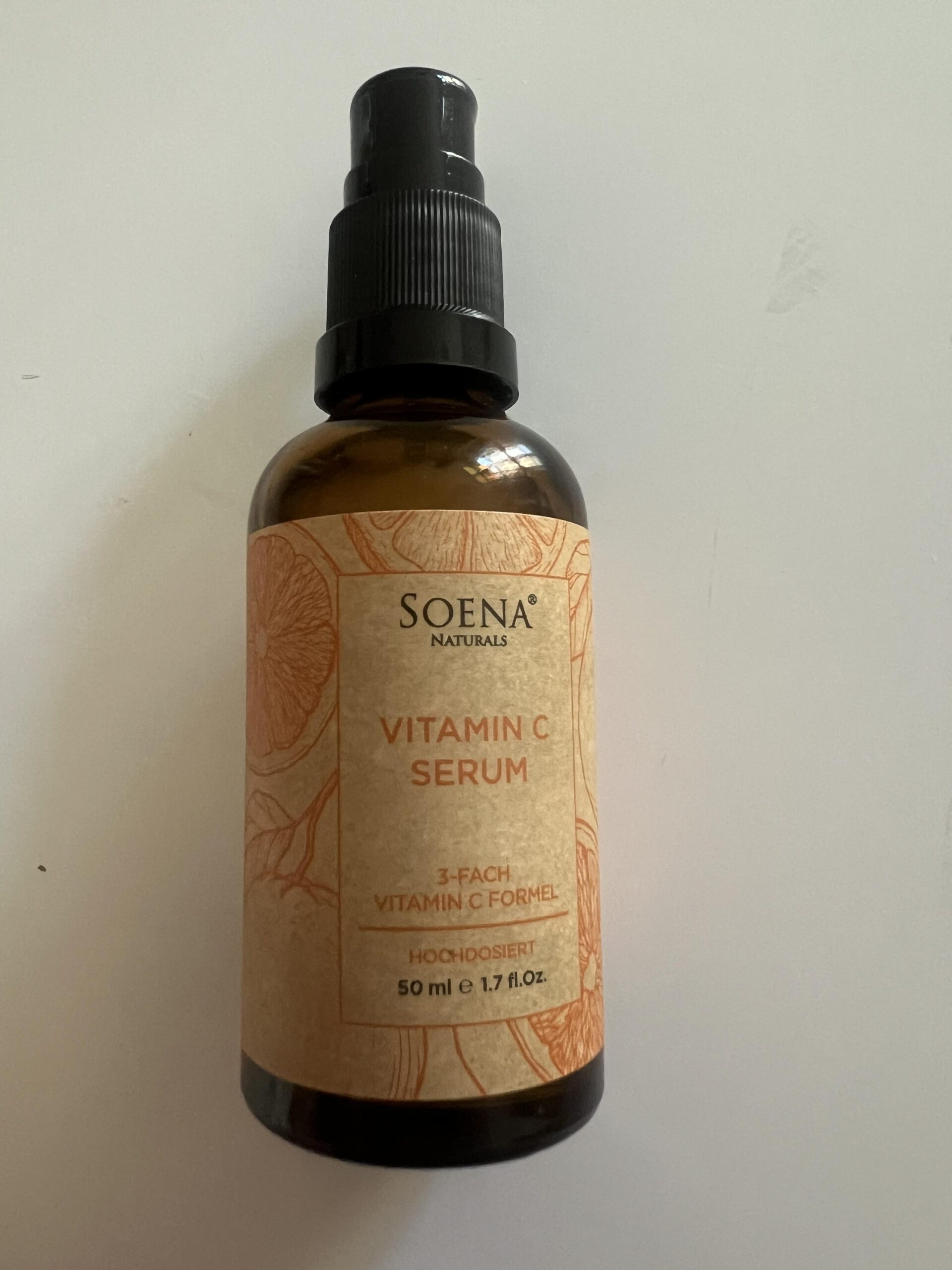 Own photograph of Soena Naturals Vitamin C Serum 50 ml bottle front with orange label and pump